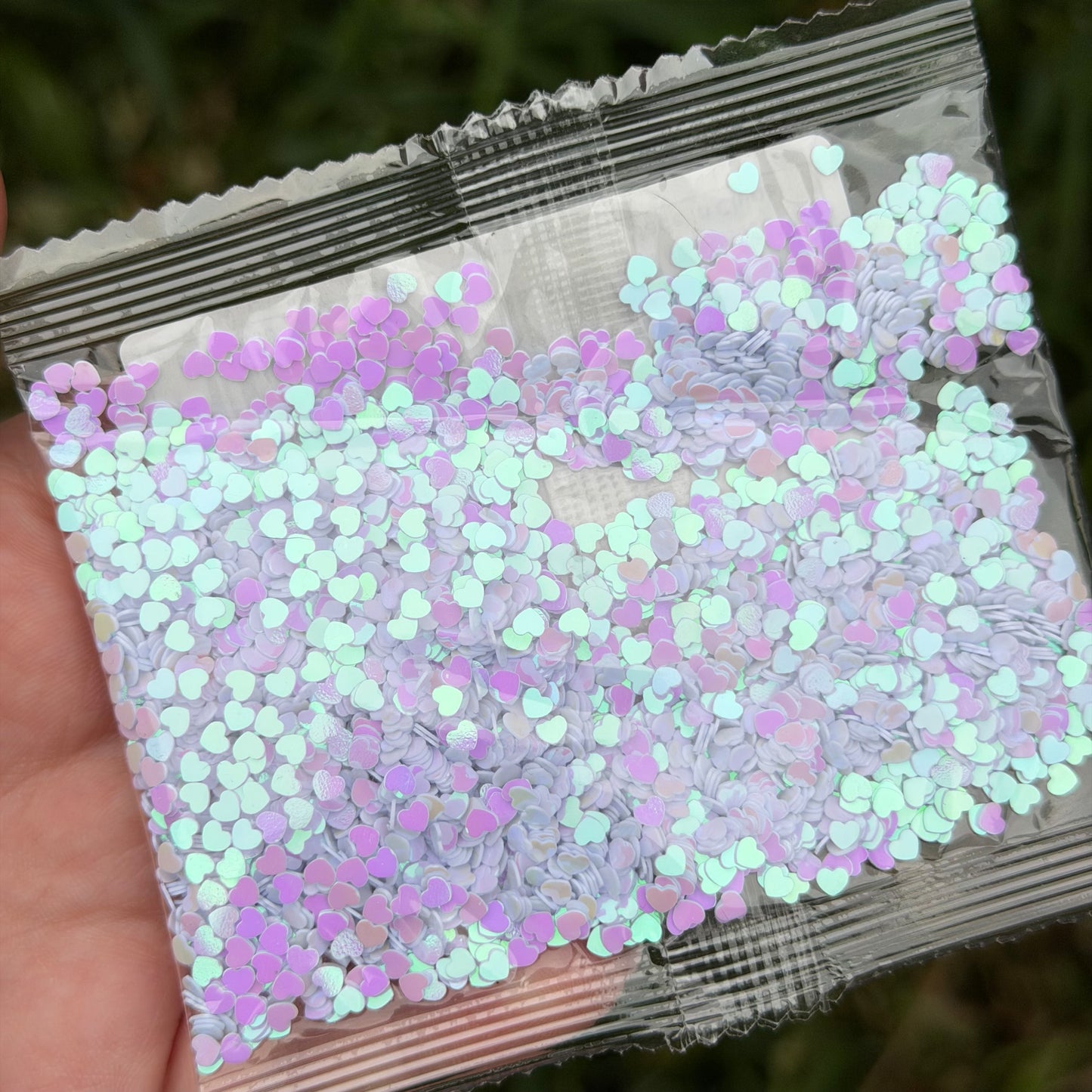 The Gypsy Glitter Tag (white hearts with purple reflects)